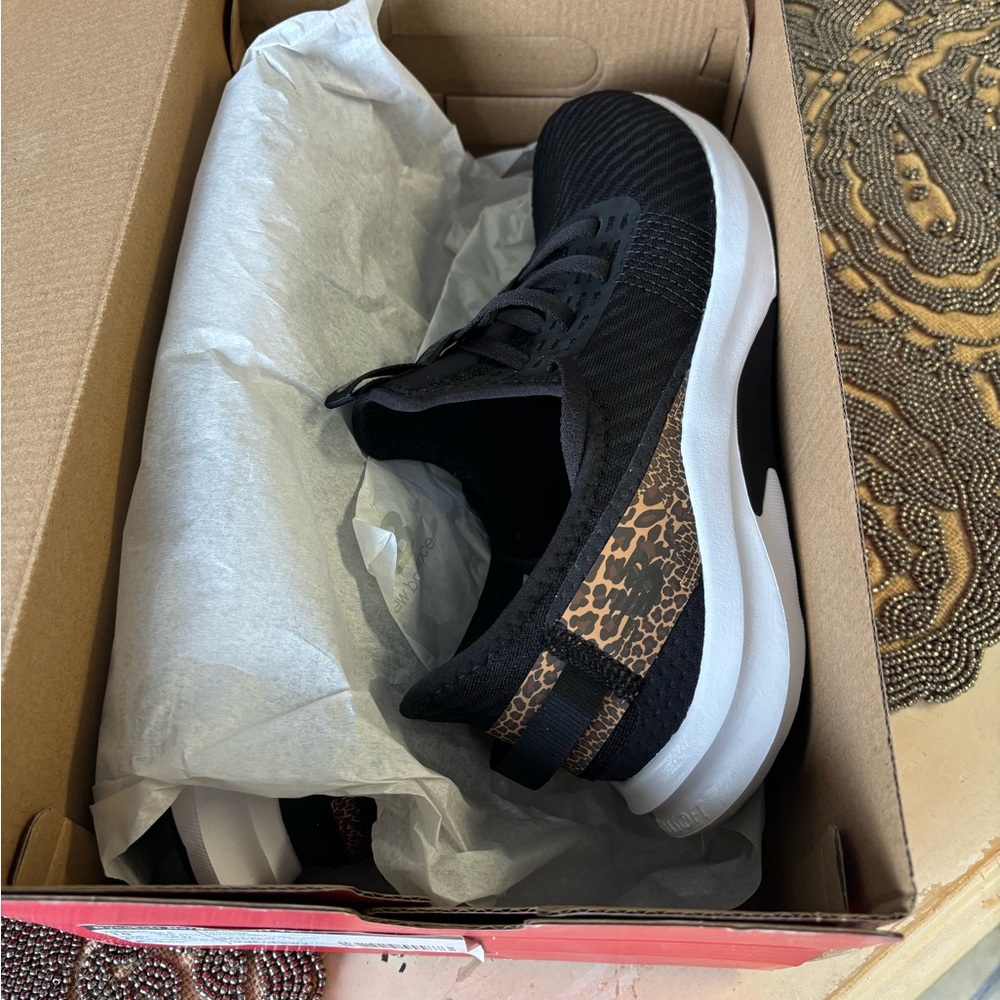 New Balance Black and Gold Athletic Shoes - Picture 2 of 3
